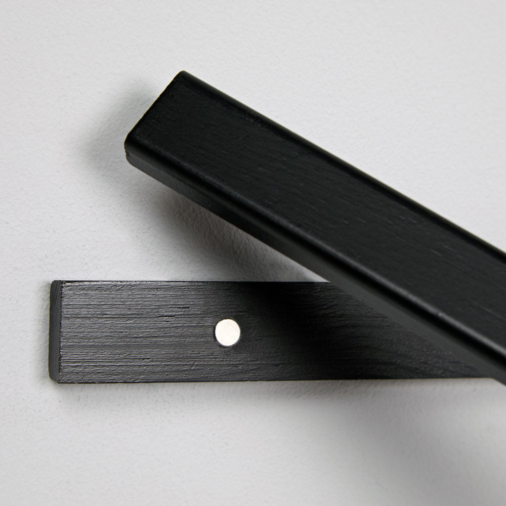 Black wooden poster hanger