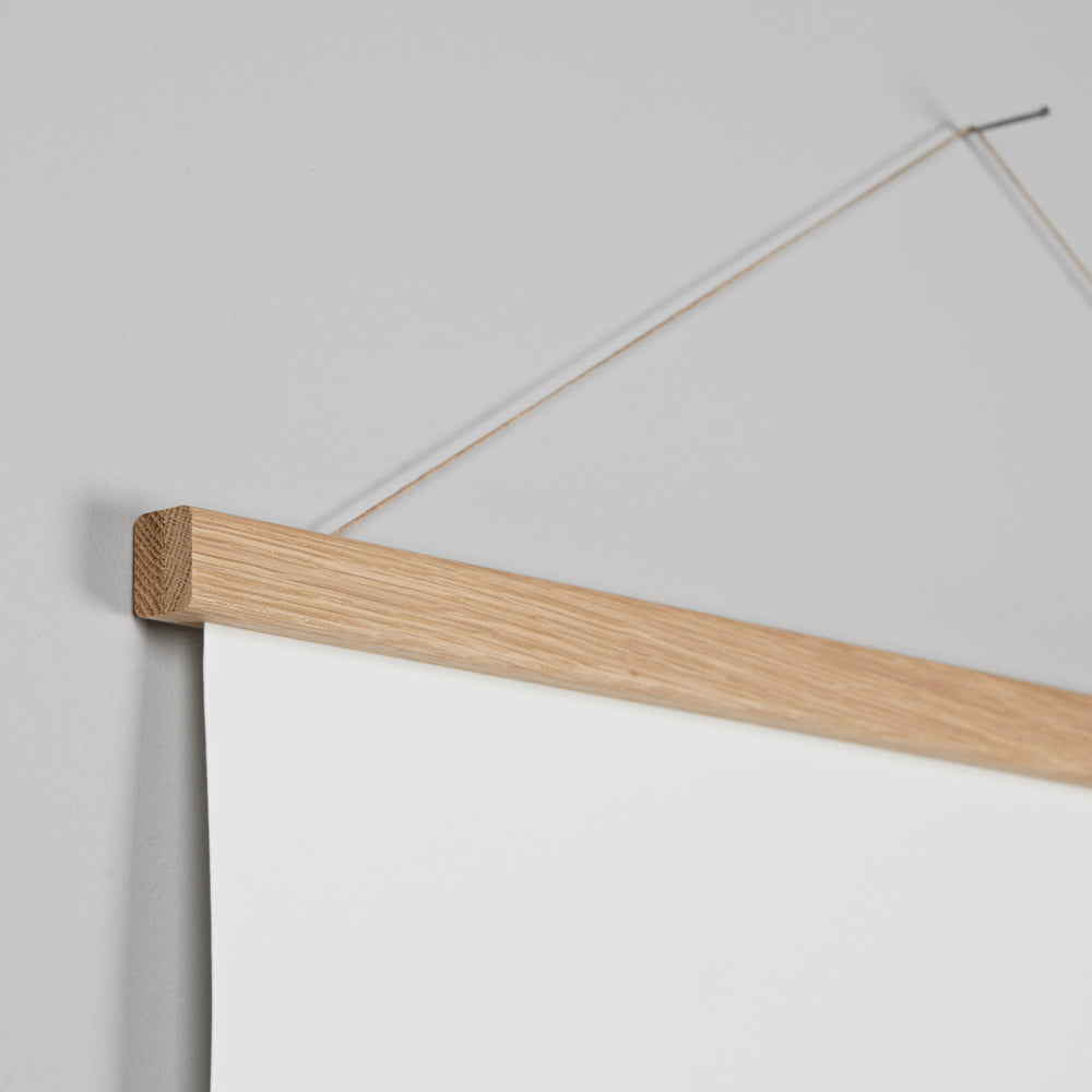 Natural wood hanger on wall